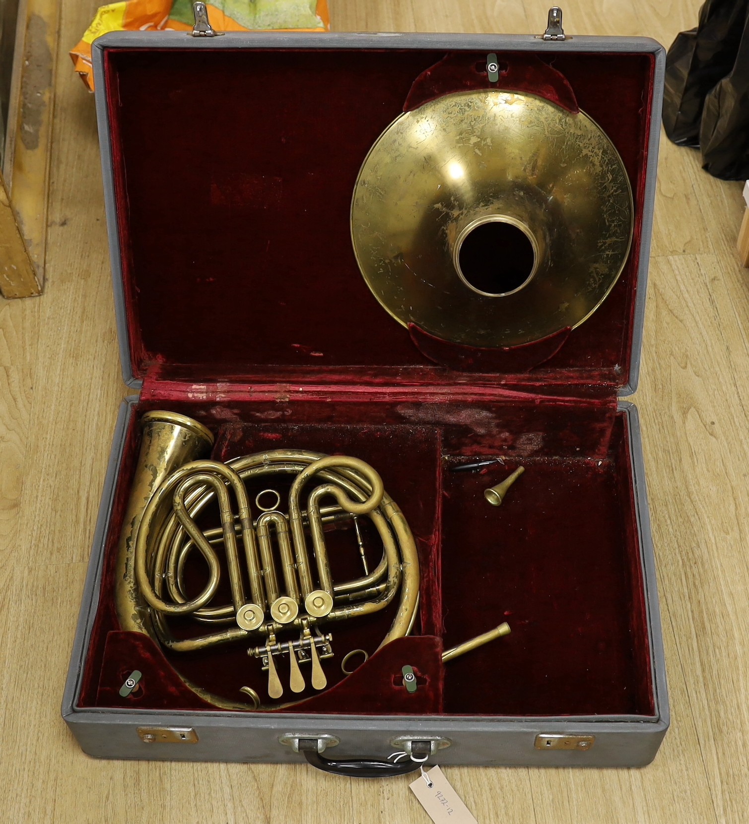 A trumpet and a French Horn (both cased)